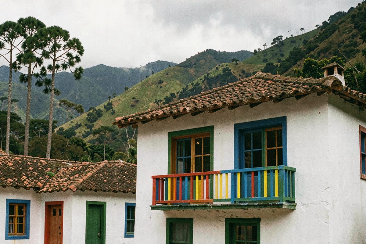 Whitewashed houses with colourful balconies and window frames in Colombia's coffee region (illustrative image)