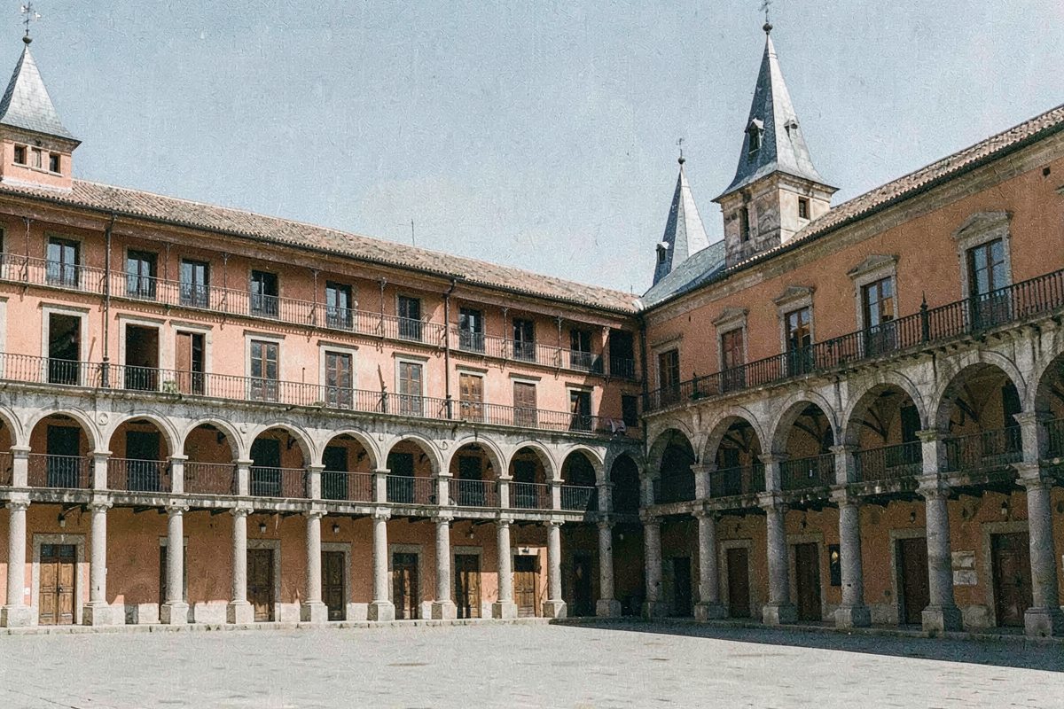 Arcaded square with slate-spired towers in Madrid (illustrative image)